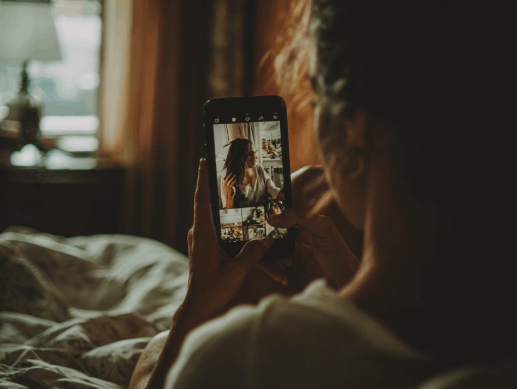 woman scrolling through social media looking at photos